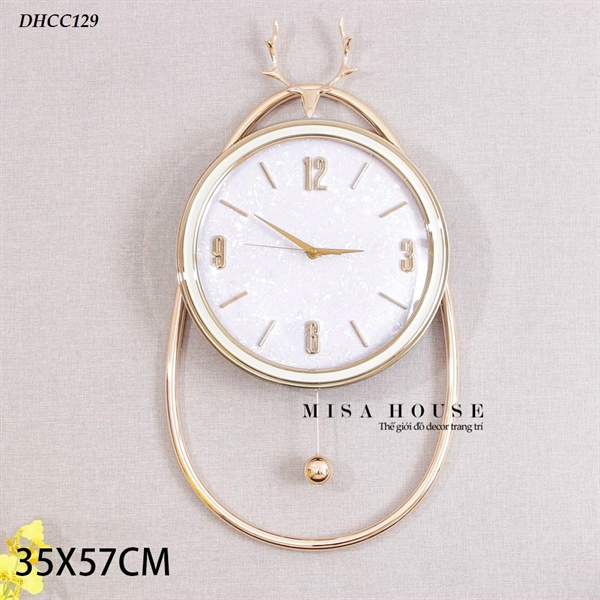 Đồng hồ treo tường trang trí kim trôi hươu mặt đá cẩm thạch cao cấp màu trắng viền vàng bầu dục – quà tặng tân gia sang trọng Đồng hồ treo tường trang trí kim trôi hươu mặt đá cẩm thạch cao cấp màu trắng viền vàng bầu dục – quà tặng tân gia sang trọng